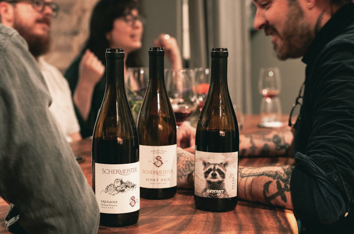 Friends and bottles of Schermeister wine